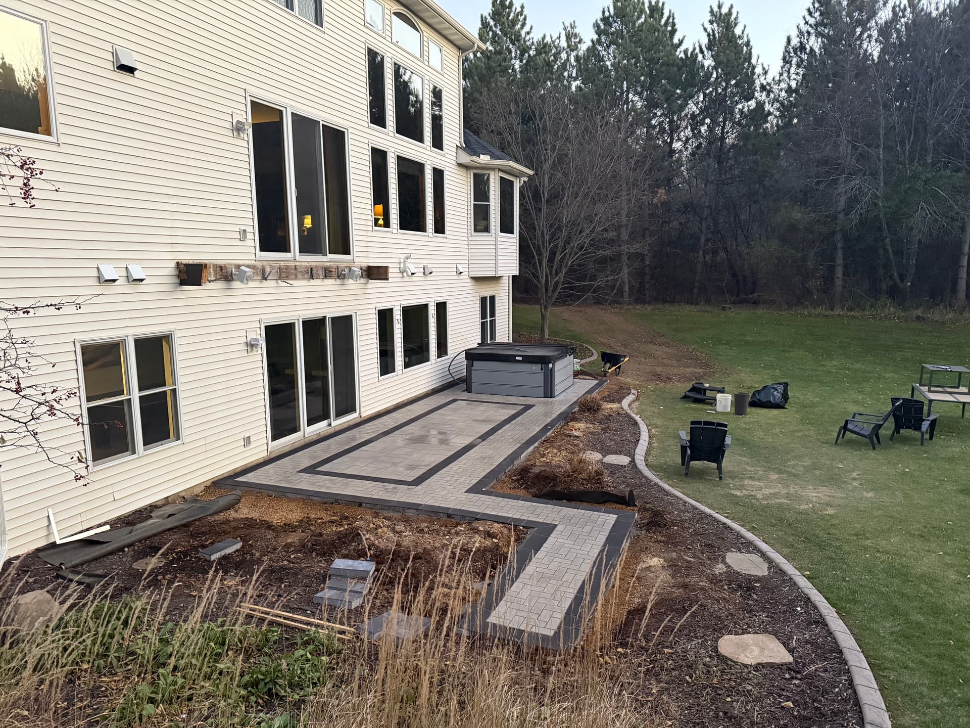 Custom Paver Patio With Hot Tub Pad and Overhead Deck