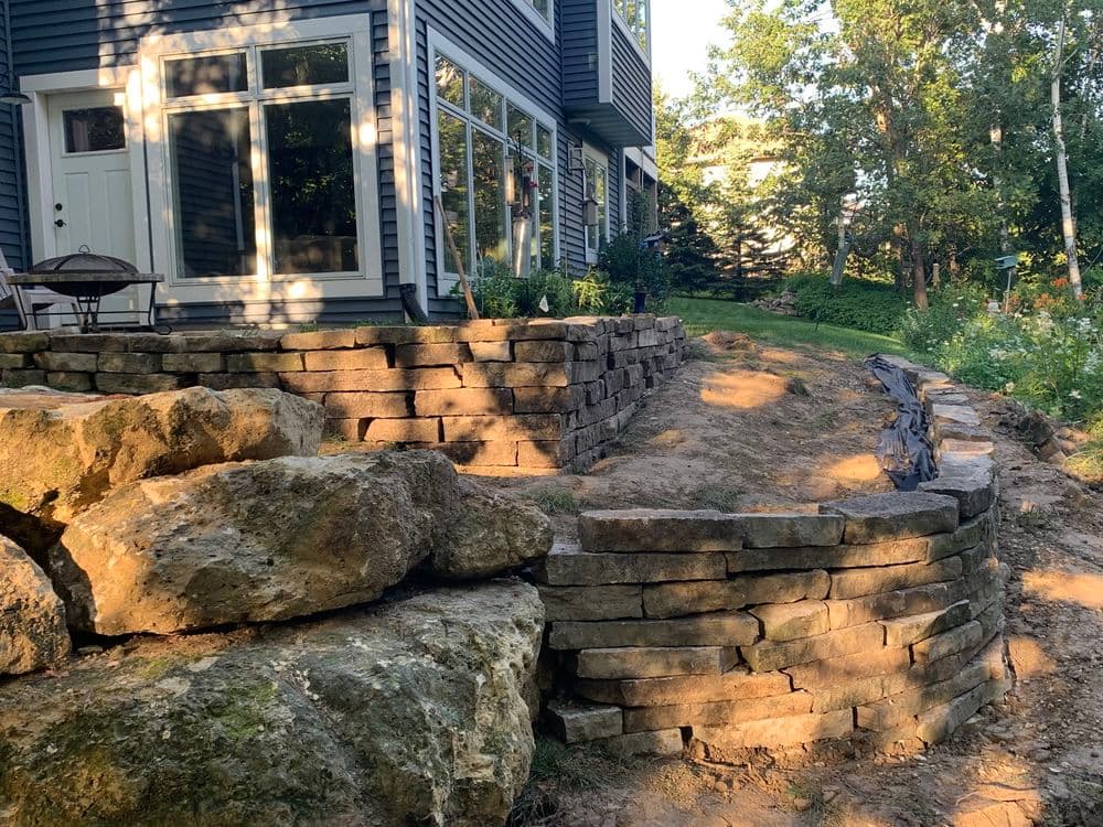A stone pathway surrounded by greenery