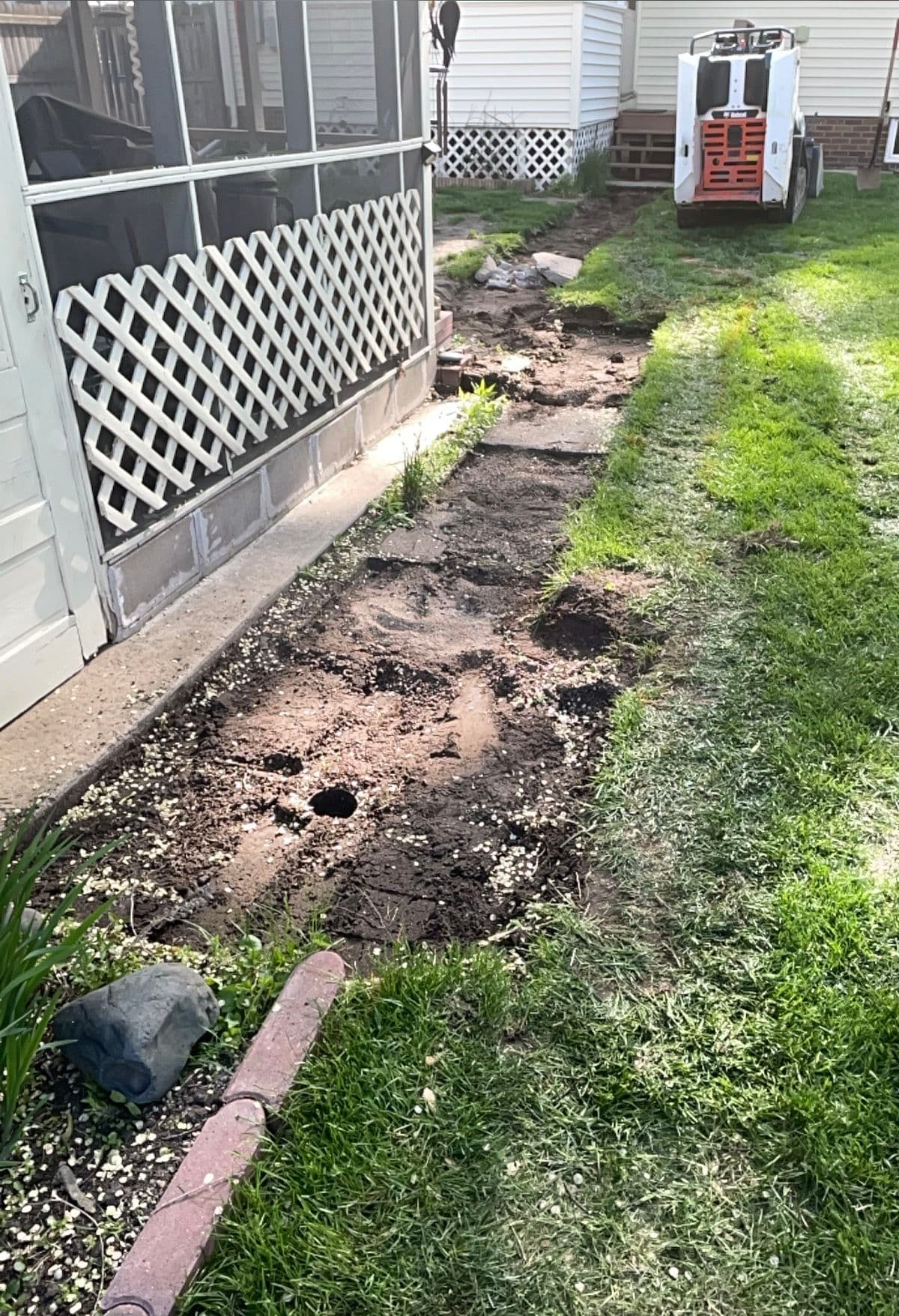 Gallery photos for Permeable Paver Walkway Solves a Real Backyard Drainage Problem: Image #1